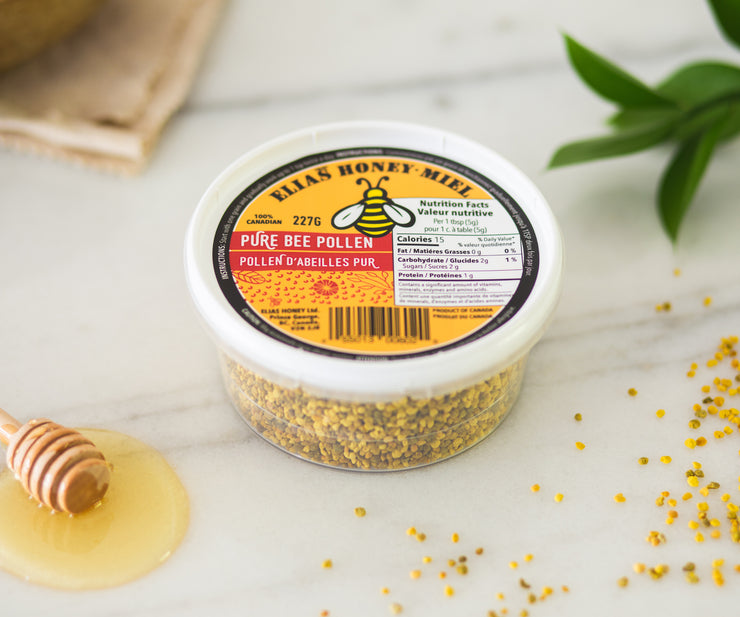 Image of Elias Honey pure bee pollen on table with the text ‘specialty products’