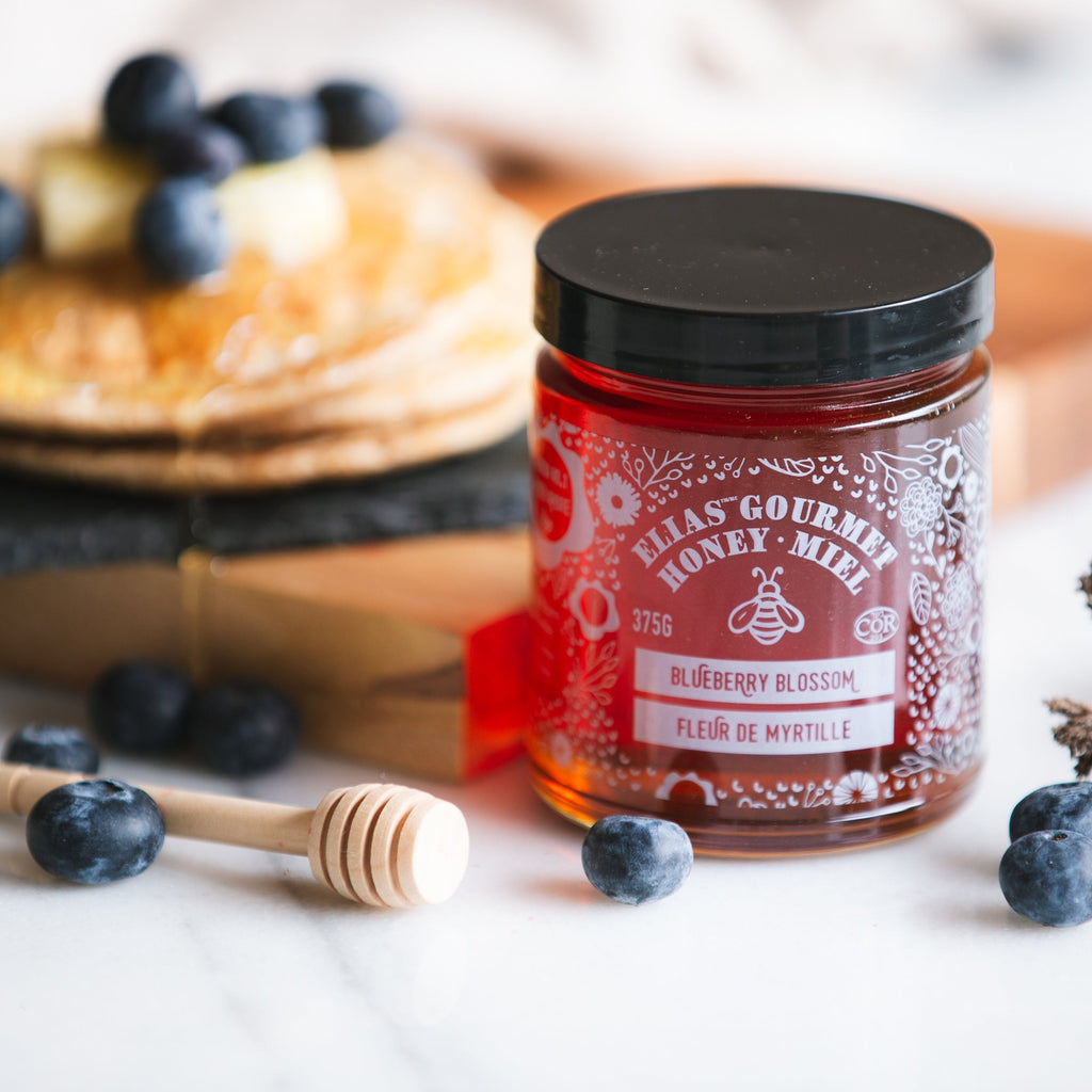 Blueberry Blossom Jar with pancakes and blueberries in the background